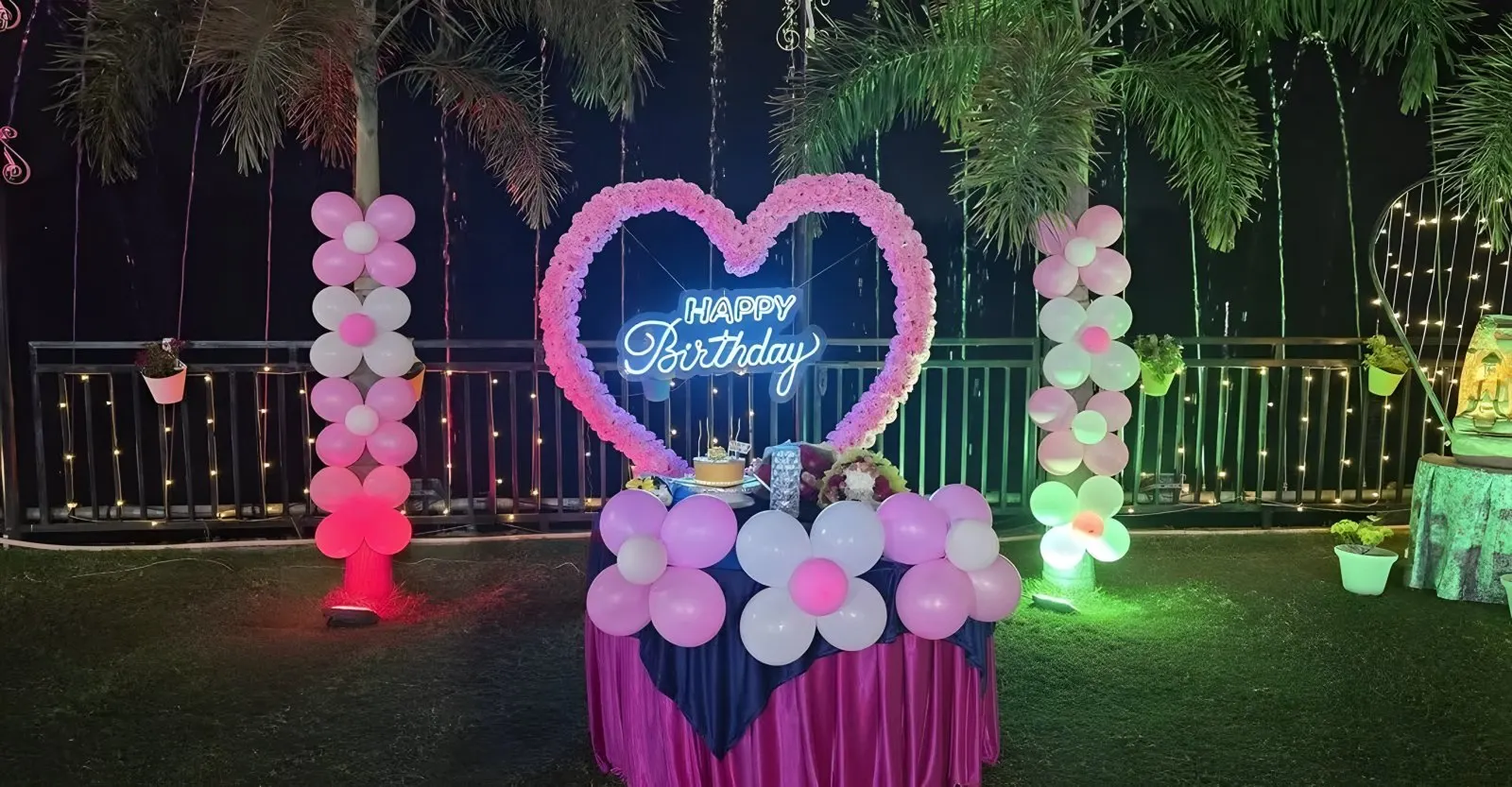 Birthday decorations with balloons on the lawn